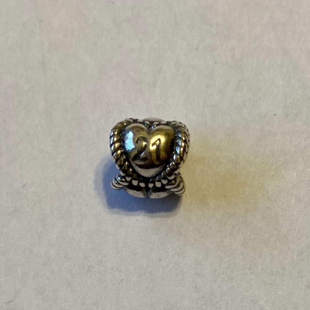 Pandora jewelry silver charm.